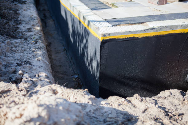 Professional Waterproofing technician working in Forest, IN